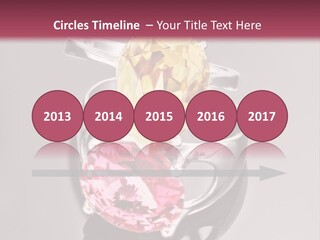 A Ring With A Yellow And Pink Stone On It PowerPoint Template