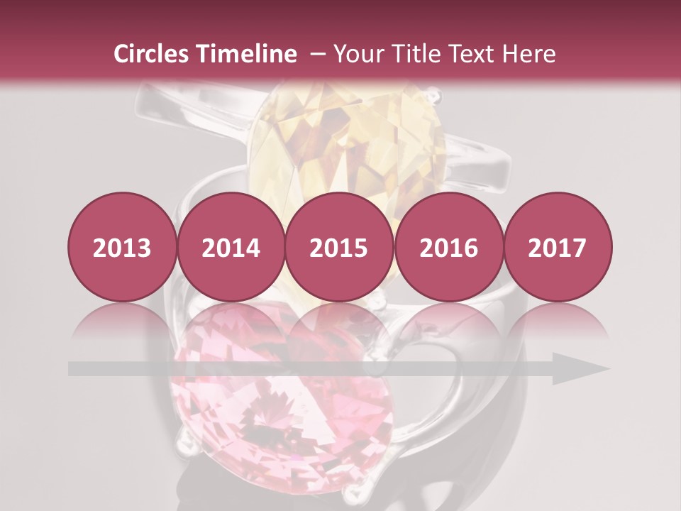 A Ring With A Yellow And Pink Stone On It PowerPoint Template