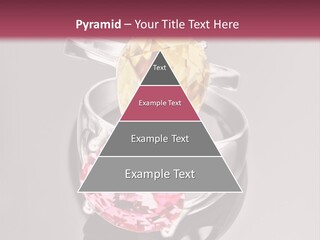 A Ring With A Yellow And Pink Stone On It PowerPoint Template