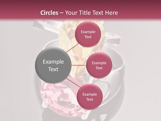 A Ring With A Yellow And Pink Stone On It PowerPoint Template