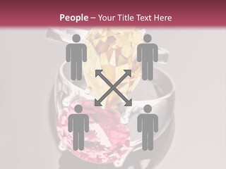 A Ring With A Yellow And Pink Stone On It PowerPoint Template