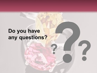 A Ring With A Yellow And Pink Stone On It PowerPoint Template