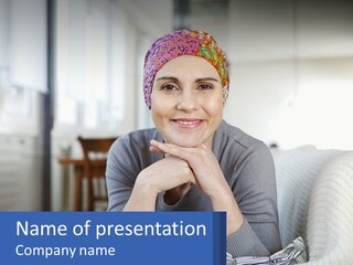 A Woman Sitting On A Couch With Her Hand On Her Chin PowerPoint Template
