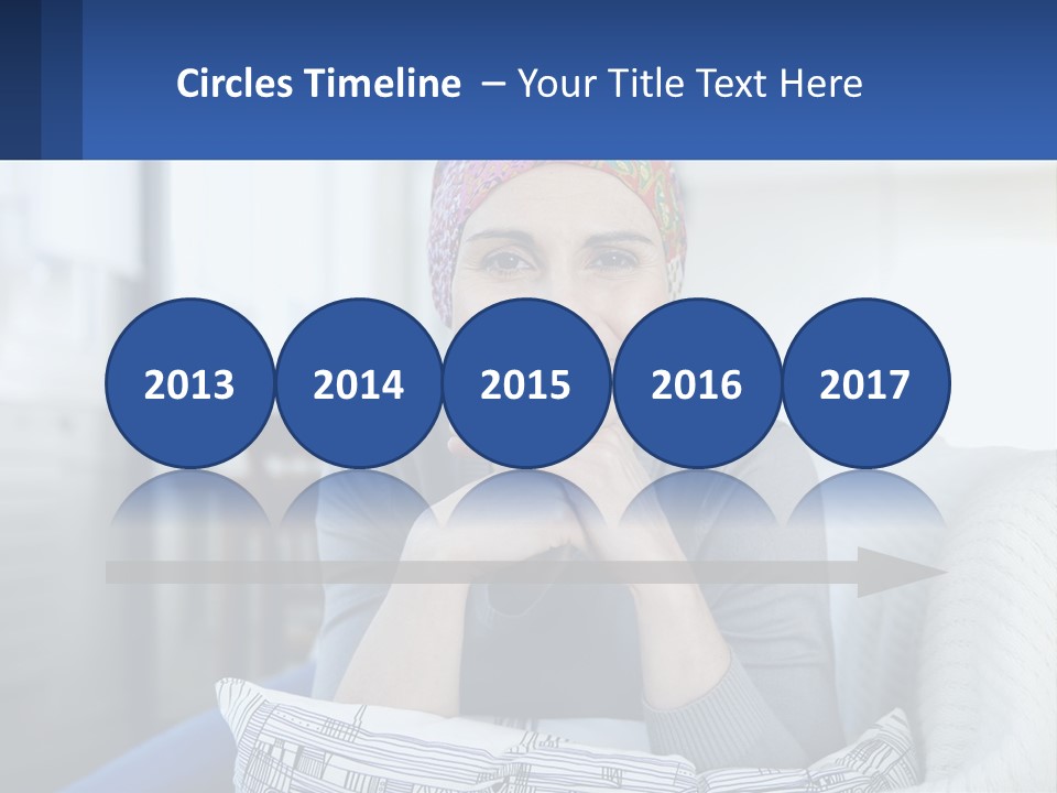 A Woman Sitting On A Couch With Her Hand On Her Chin PowerPoint Template