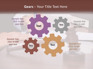 A Person Signing A Document On A Desk PowerPoint Template