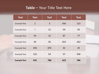 A Person Signing A Document On A Desk PowerPoint Template