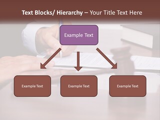A Person Signing A Document On A Desk PowerPoint Template