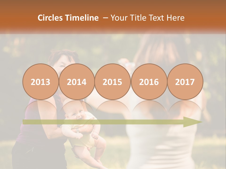 A Woman Taking A Picture Of A Woman Holding A Baby PowerPoint Template