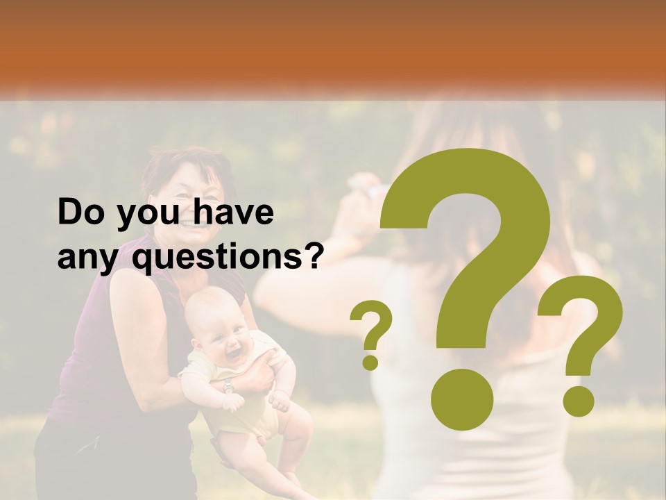 A Woman Taking A Picture Of A Woman Holding A Baby PowerPoint Template