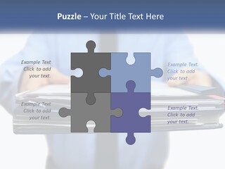 A Man Holding A Stack Of Files In His Hands PowerPoint Template
