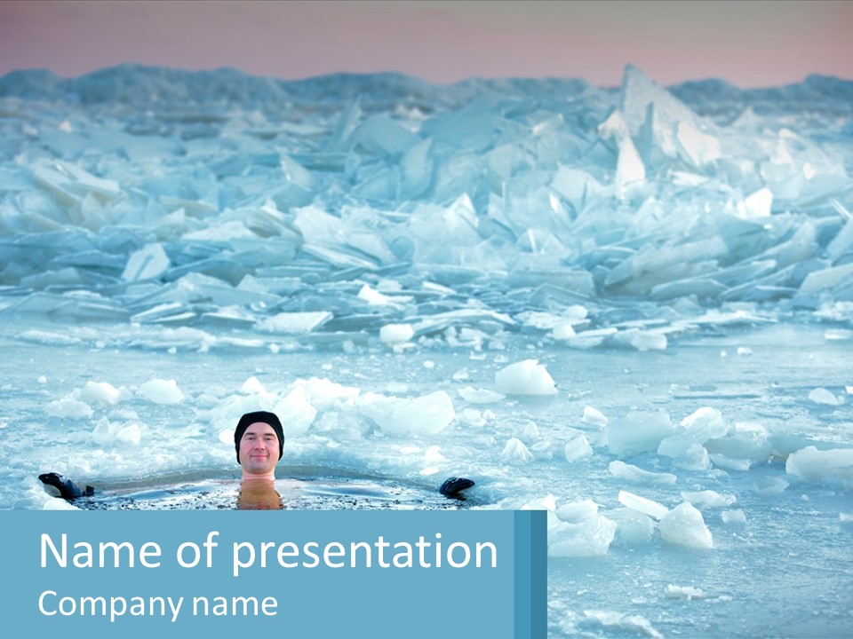 A Man Swimming In A Body Of Water Surrounded By Ice PowerPoint Template