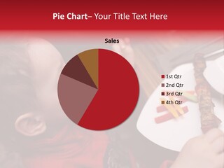 A Young Child Is Eating A Piece Of Food PowerPoint Template