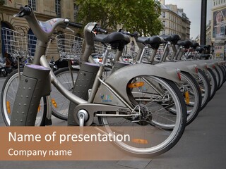 A Row Of Bicycles Parked Next To Each Other PowerPoint Template