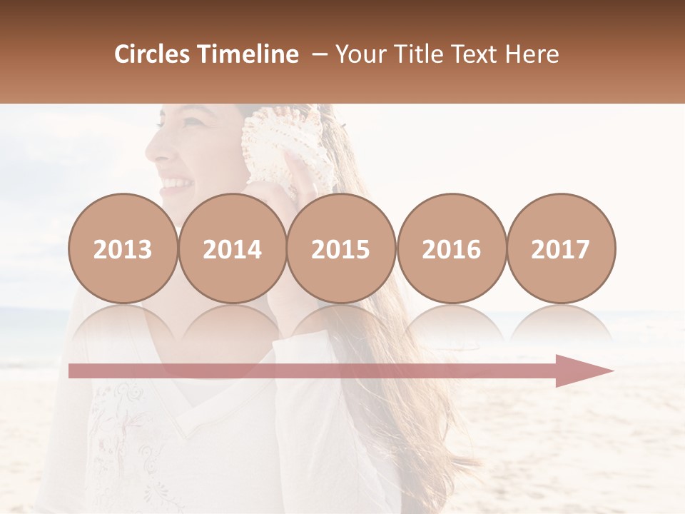 A Woman Holding A Seashell On The Beach PowerPoint Template