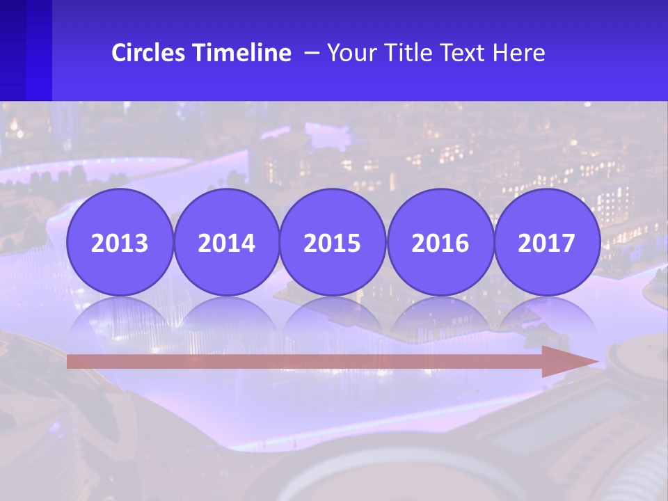 A Model Of A City At Night With A Fountain PowerPoint Template