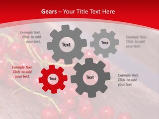 A Bunch Of Red Berries Sitting On Top Of A Wooden Table PowerPoint Template