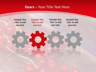 A Bunch Of Red Berries Sitting On Top Of A Wooden Table PowerPoint Template