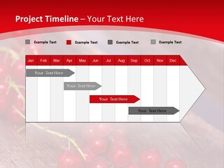 A Bunch Of Red Berries Sitting On Top Of A Wooden Table PowerPoint Template