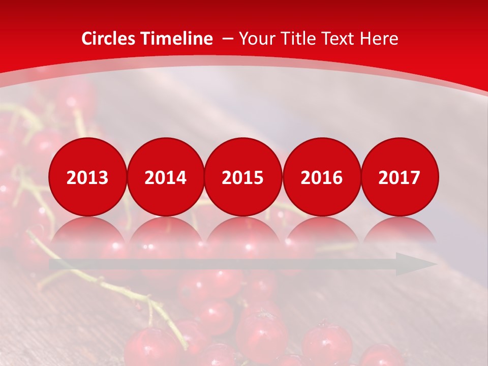 A Bunch Of Red Berries Sitting On Top Of A Wooden Table PowerPoint Template
