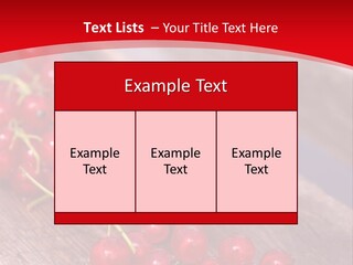 A Bunch Of Red Berries Sitting On Top Of A Wooden Table PowerPoint Template