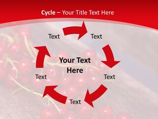 A Bunch Of Red Berries Sitting On Top Of A Wooden Table PowerPoint Template