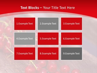 A Bunch Of Red Berries Sitting On Top Of A Wooden Table PowerPoint Template