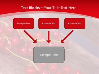 A Bunch Of Red Berries Sitting On Top Of A Wooden Table PowerPoint Template
