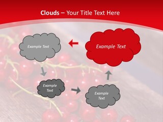A Bunch Of Red Berries Sitting On Top Of A Wooden Table PowerPoint Template