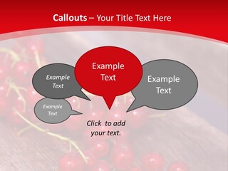 A Bunch Of Red Berries Sitting On Top Of A Wooden Table PowerPoint Template