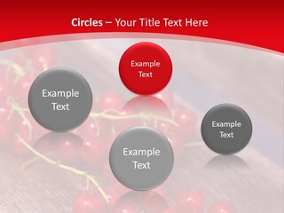 A Bunch Of Red Berries Sitting On Top Of A Wooden Table PowerPoint Template
