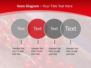 A Bunch Of Red Berries Sitting On Top Of A Wooden Table PowerPoint Template