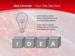 A Bunch Of Red Berries Sitting On Top Of A Wooden Table PowerPoint Template