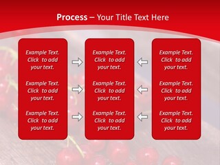 A Bunch Of Red Berries Sitting On Top Of A Wooden Table PowerPoint Template