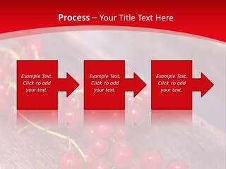 A Bunch Of Red Berries Sitting On Top Of A Wooden Table PowerPoint Template