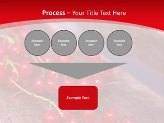 A Bunch Of Red Berries Sitting On Top Of A Wooden Table PowerPoint Template