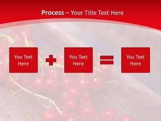 A Bunch Of Red Berries Sitting On Top Of A Wooden Table PowerPoint Template
