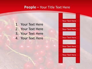 A Bunch Of Red Berries Sitting On Top Of A Wooden Table PowerPoint Template