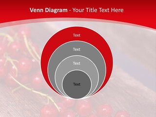 A Bunch Of Red Berries Sitting On Top Of A Wooden Table PowerPoint Template