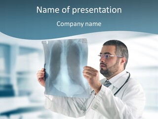 A Doctor Holding Up A X - Ray Image In Front Of His Face PowerPoint Template