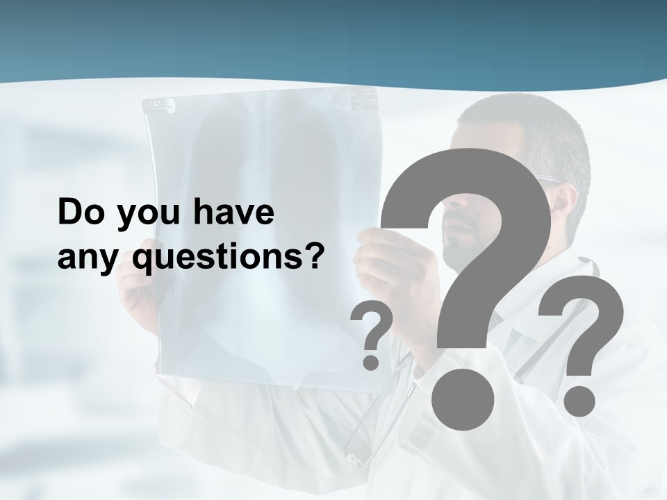 A Doctor Holding Up A X - Ray Image In Front Of His Face PowerPoint Template