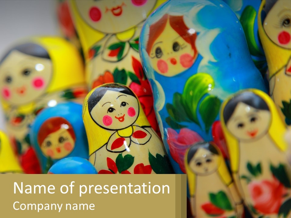 A Group Of Colorful Nesting Dolls On Display PowerPoint Template