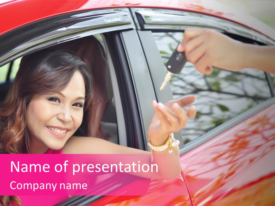A Woman In A Red Car Holding A Car Key PowerPoint Template