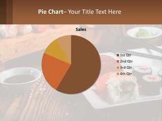 A Plate Of Sushi And Chopsticks On A Table PowerPoint Template