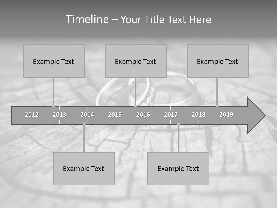 Two Wedding Rings Sitting On Top Of A Brick Floor PowerPoint Template