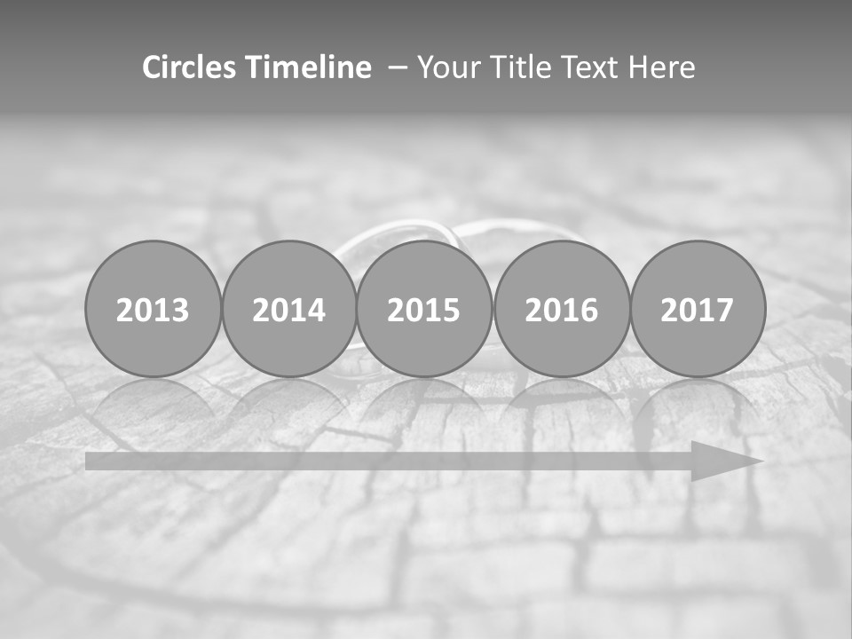 Two Wedding Rings Sitting On Top Of A Brick Floor PowerPoint Template