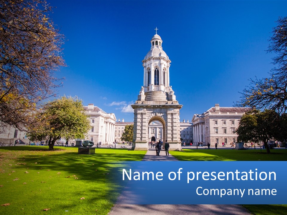 A Large Building With A Clock Tower In The Middle Of It PowerPoint Template