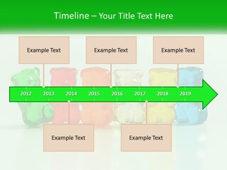 A Group Of Gummy Bears Sitting Next To Each Other PowerPoint Template