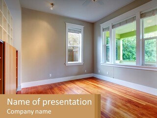 An Empty Room With Wood Floors And Windows PowerPoint Template