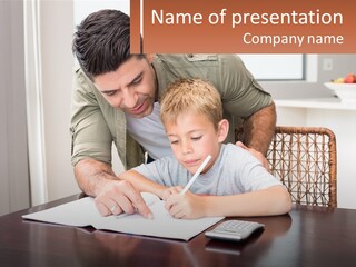 A Man Helping A Young Boy Write Something On A Piece Of Paper PowerPoint Template