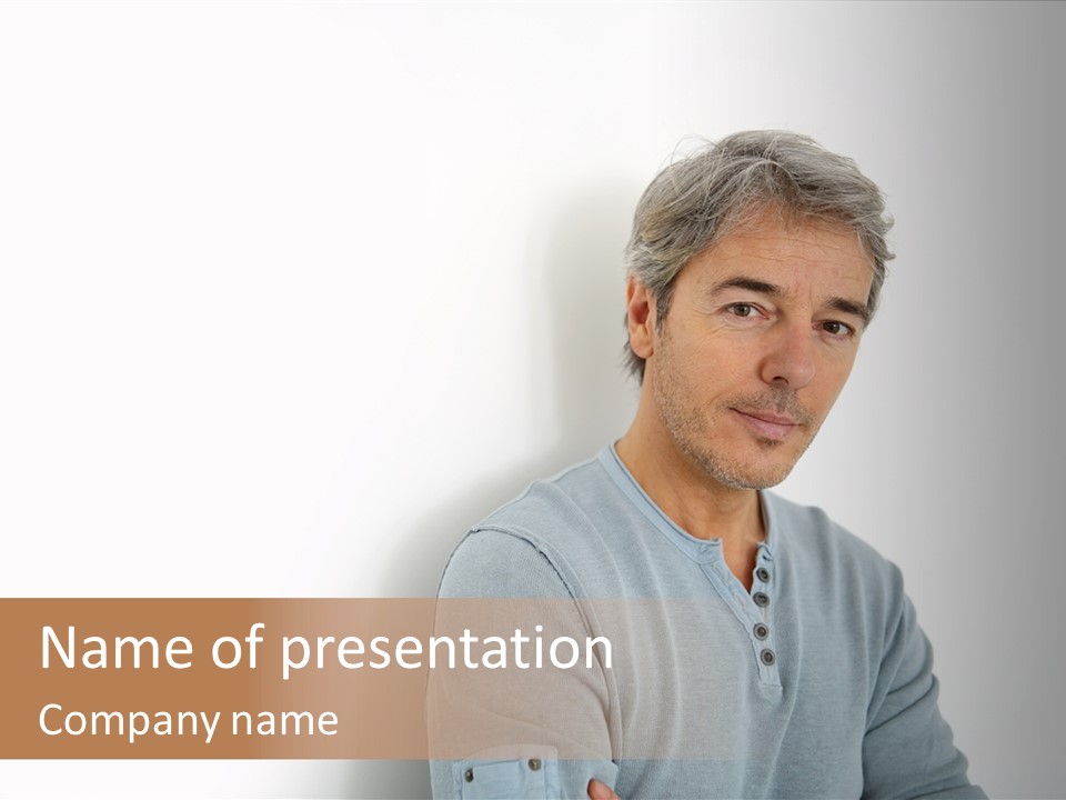 A Man In A Blue Shirt Is Posing For A Picture PowerPoint Template